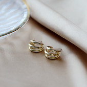 Elegantne ženske okrugle naušnice jednobojni model