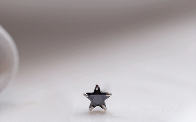 Малки дамски обеци във формата на звезда