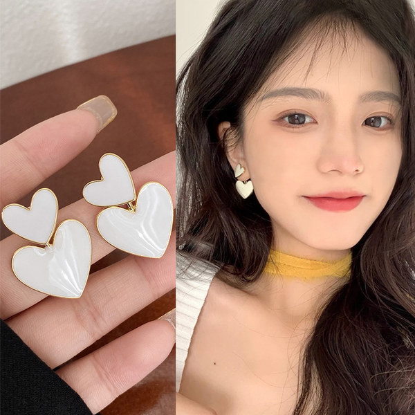Модерни обеци във формата на сърце с бял камък