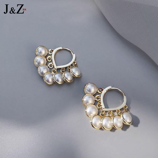 Ženske naušnice sa bisernim ukrasom - zlatne boje