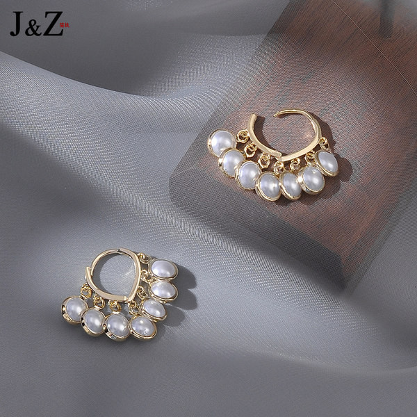 Ženske naušnice sa bisernim ukrasom - zlatne boje