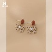 Ženske naušnice s trakom na točkice