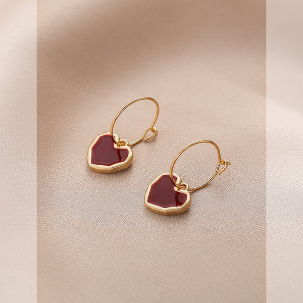 Viseće ženske naušnice sa srcem