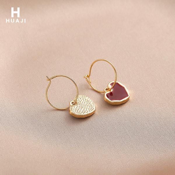 Viseće ženske naušnice sa srcem