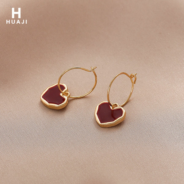 Viseće ženske naušnice sa srcem