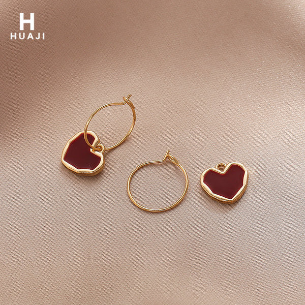 Viseće ženske naušnice sa srcem