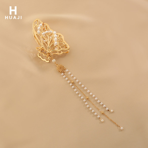 Ženska ukosnica sa bisernim ukrasom - zlatne boje