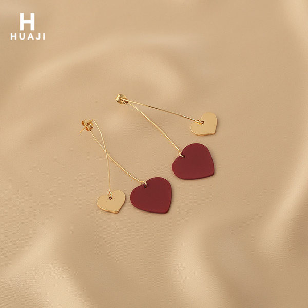 Дълги дамски обеци с висулка сърца