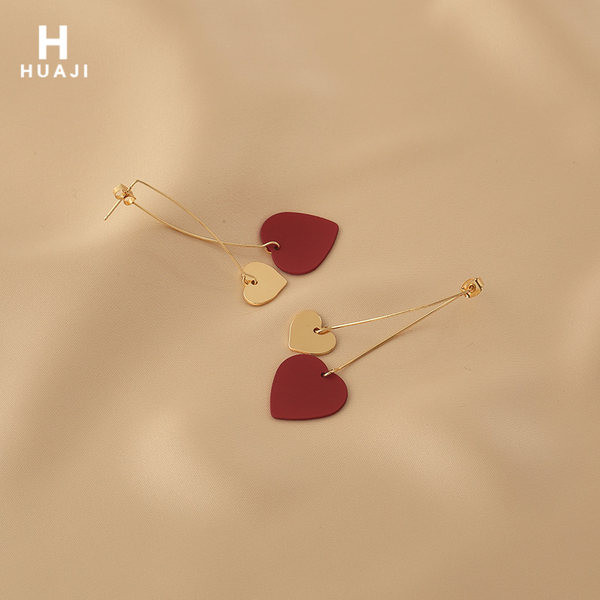 Дълги дамски обеци с висулка сърца