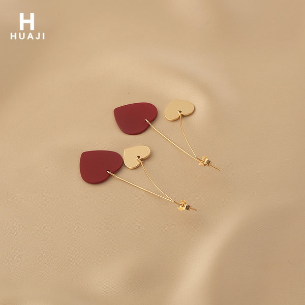 Дълги дамски обеци с висулка сърца