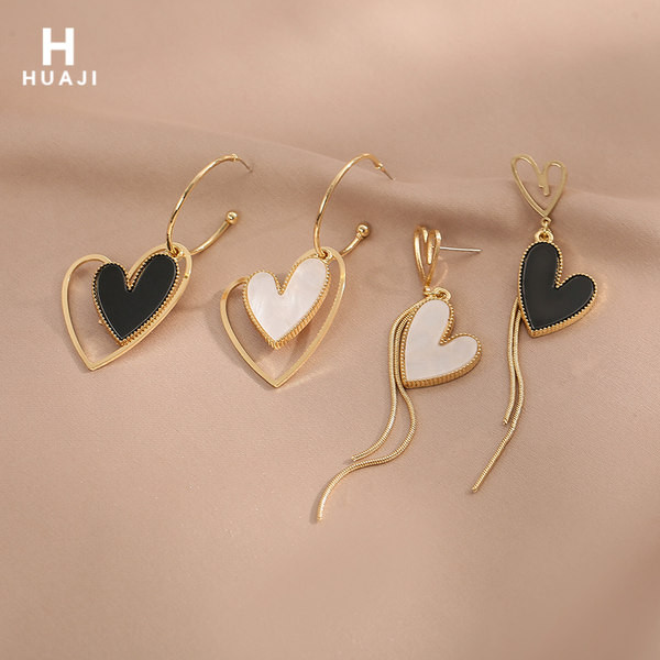 Aktuelne ženske naušnice dugi model sa privjeskom u obliku srca