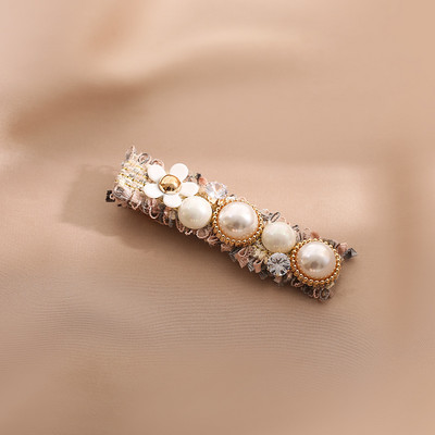 Актуална фиба за коса с декоративи перли и камъни