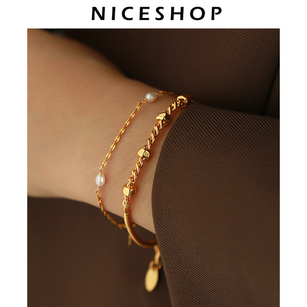 Γυναικείο βραχιόλι σε χρυσό χρώμα - δύο μοντέλα