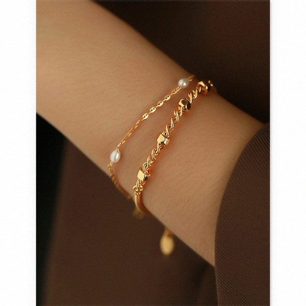 Γυναικείο βραχιόλι σε χρυσό χρώμα - δύο μοντέλα