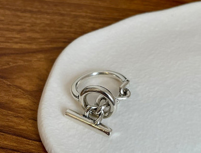 Ασημένιο ρυθμιζόμενο δαχτυλίδι με πλέξη και κόμπο