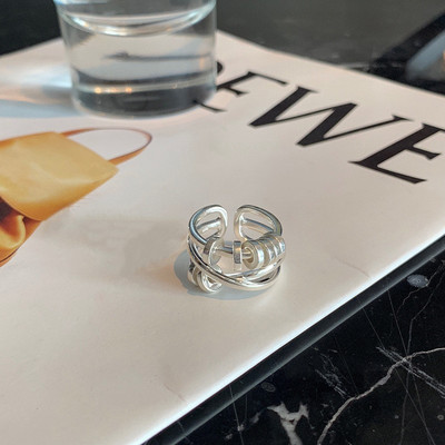 Ασημένιο ρυθμιζόμενο δαχτυλίδι με πλέξη και κόμπο