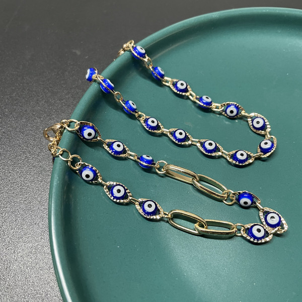 Γυναικείο βραχιόλι σε χρυσό χρώμα με μπλε μάτι