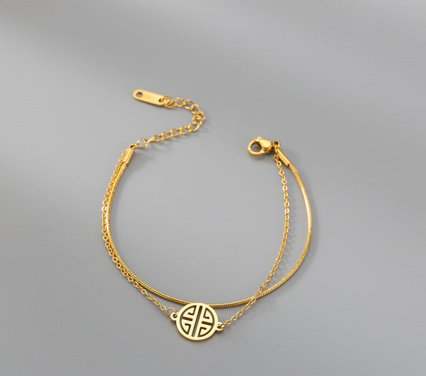 Γυναικείο διπλό βραχιόλι σε χρυσό χρώμα