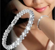 Κομψό γυναικείο βραχιόλι με πέτρες σε ασήμι και χρυσό χρώμα