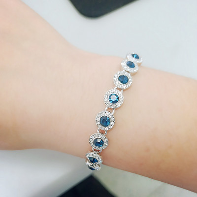 Κομψό γυναικείο βραχιόλι με στρογγυλές πέτρες σε διάφορα χρώματα