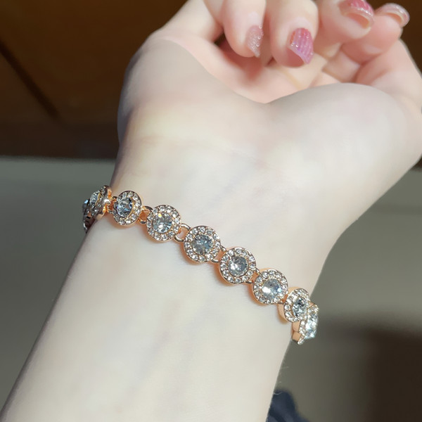 Κομψό γυναικείο βραχιόλι με στρογγυλές πέτρες σε διάφορα χρώματα