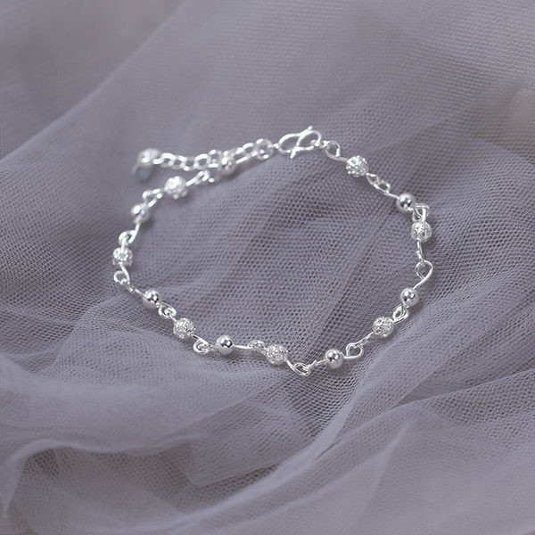 Μοντέρνο βραχιόλι με χάντρες σε ασημί χρώμα