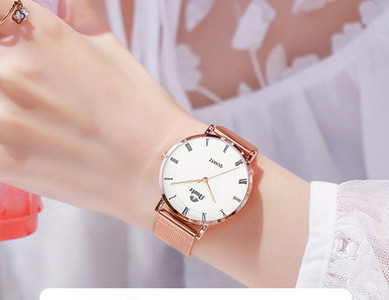 Κομψό γυναικείο ρολόι με στρογγυλό καντράν - δερμάτινο ή μεταλλικό λουράκι