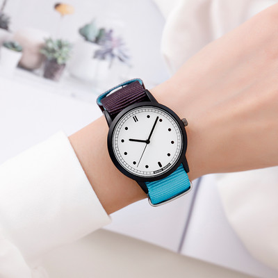 Γυναικείο ρολόι σε στρογγυλό σχήμα - υφασμάτινο λουράκι