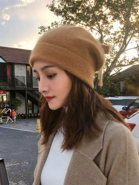 Ženska debela vunena kapa sa trakom