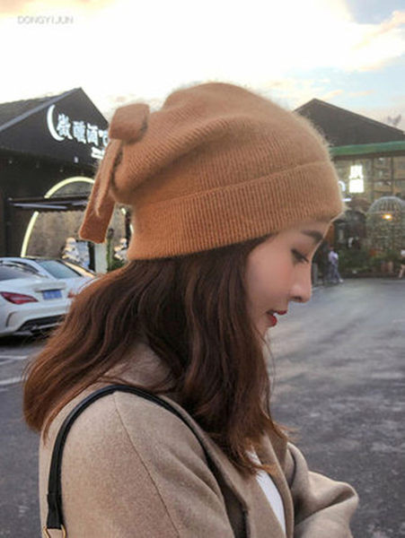 Ženska debela vunena kapa sa trakom