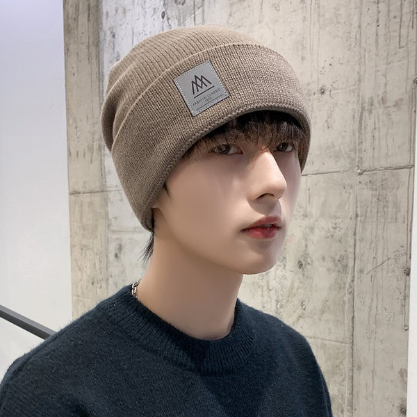 Ανδρικό χειμερινό αντιανεμικό καπέλο με έμβλημα