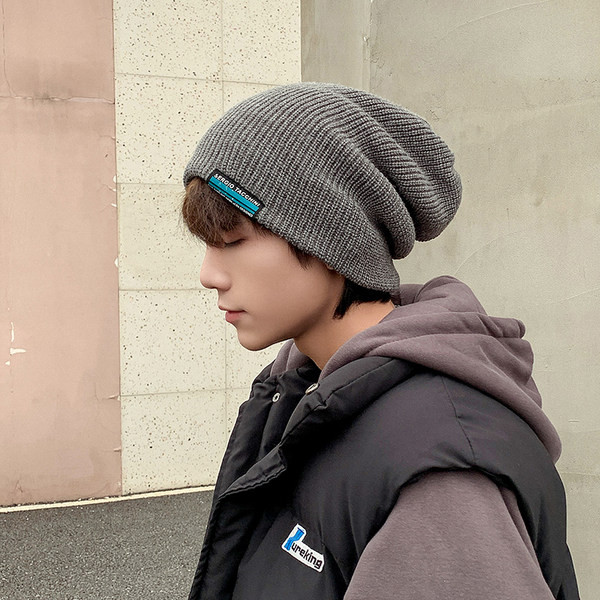 Muška jesensko-zimska pletena kapa