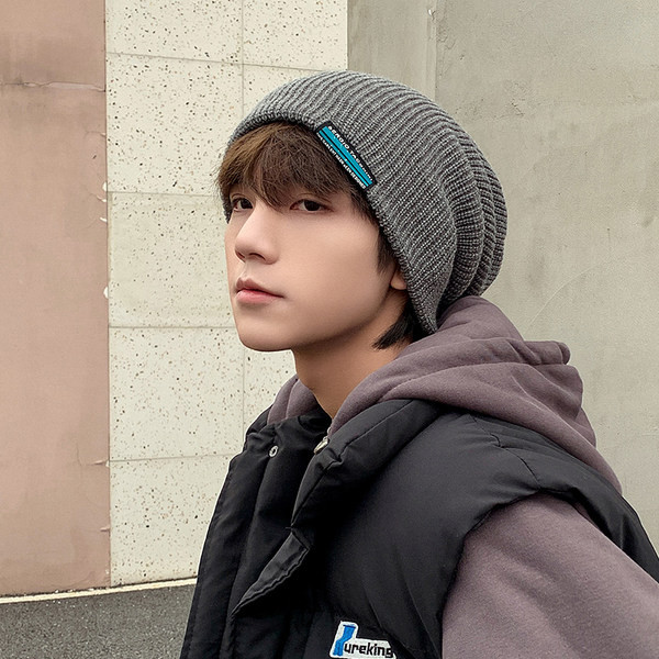 Muška jesensko-zimska pletena kapa