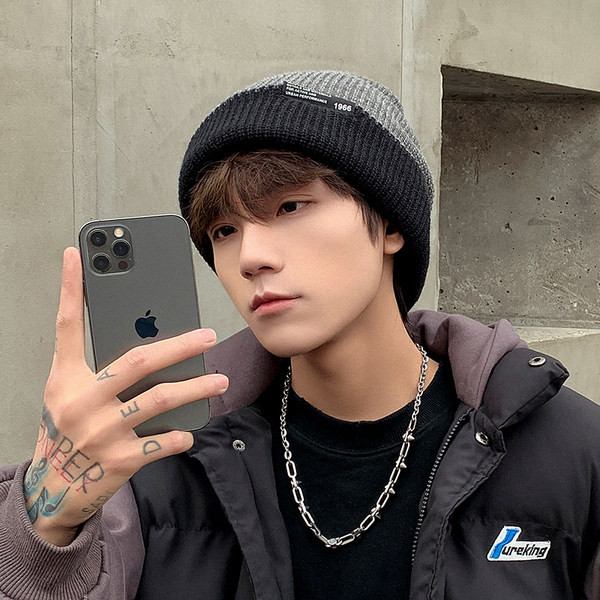 Muška jesensko-zimska pletena kapa