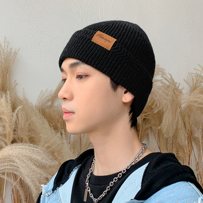 Πλεκτό ανδρικό καπέλο με έμβλημα