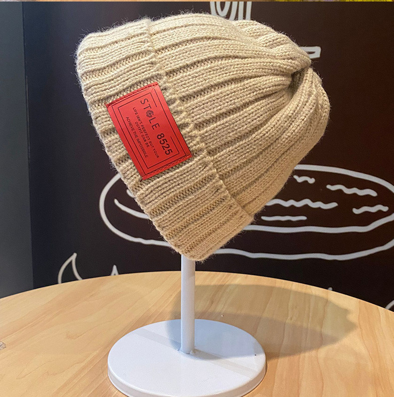 Muška vunena kapa sa grbom