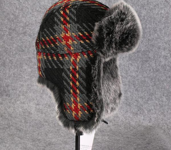 Muška karirana kapa naušnica s perom