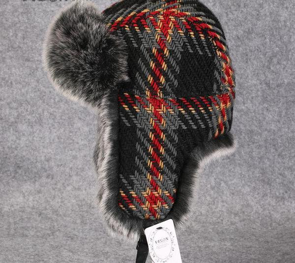 Muška karirana kapa naušnica s perom