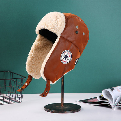 Muške naušnice s toplom postavom i vezom