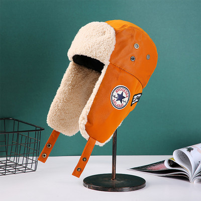 Muške naušnice s toplom postavom i vezom