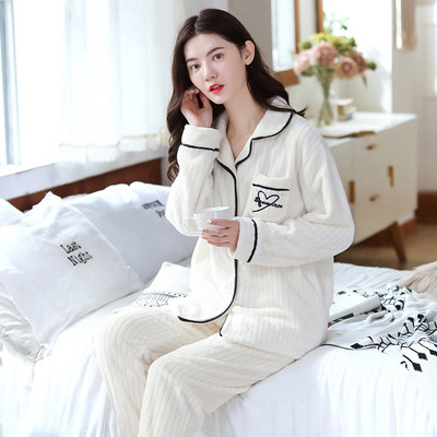 Ženska paperjasta pidžama s vezom i džepom