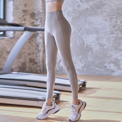 Ženske sportske i svakodnevne tajice u sivoj boji