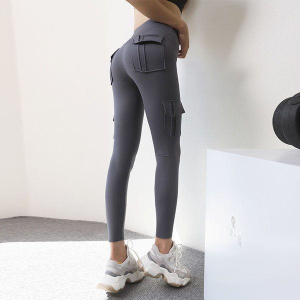 Sportske ženske duge tajice s visokim strukom i džepovima