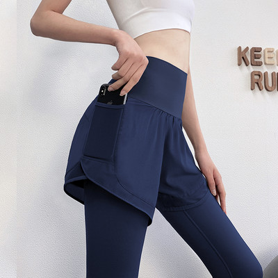 Γυναικείο αθλητικό κολάν με σορτς και τσέπη