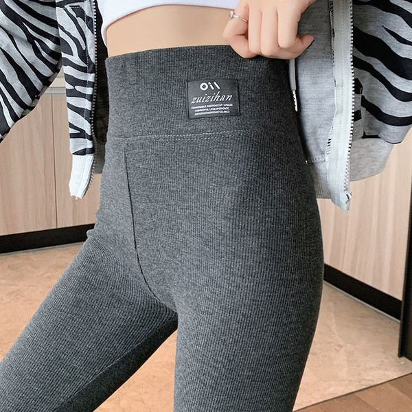 Ženske sportske tajice s visokim strukom i grbom