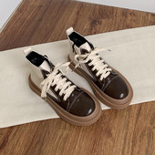 Ženske čizme s ravnim potplatom i zaobljenim patentnim zatvaračem