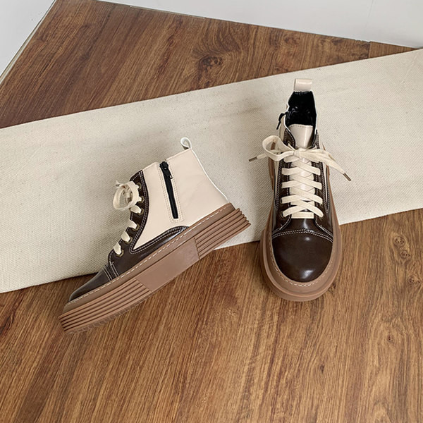 Ženske čizme s ravnim potplatom i zaobljenim patentnim zatvaračem