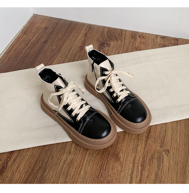 Ženske čizme s ravnim potplatom i zaobljenim patentnim zatvaračem