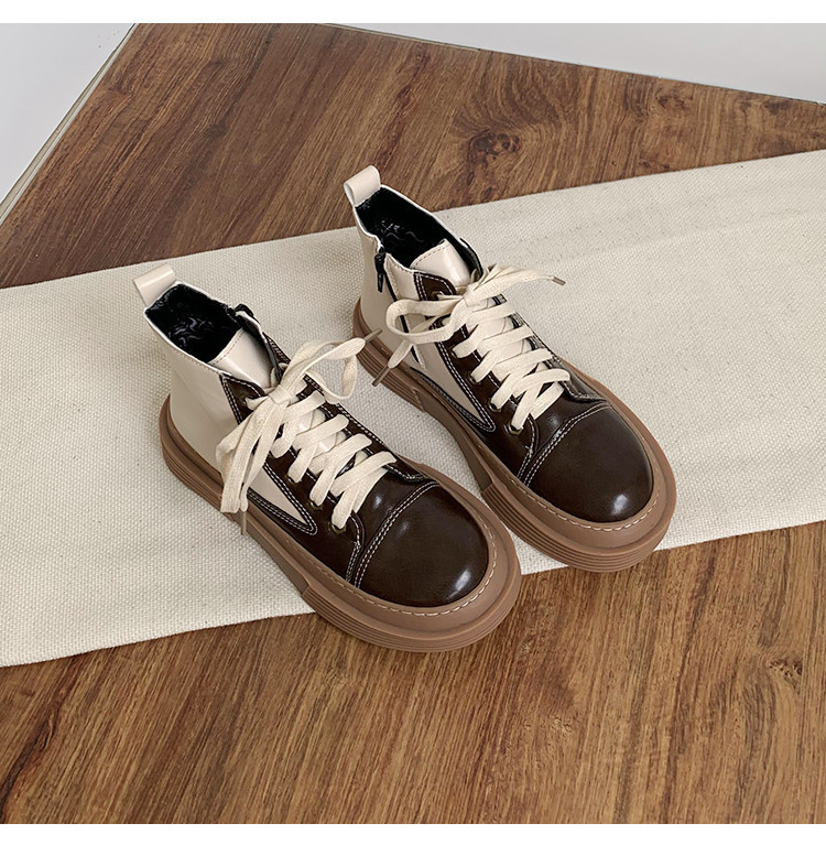 Ženske čizme s ravnim potplatom i zaobljenim patentnim zatvaračem