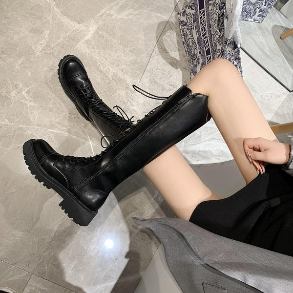 Ženske čizme na vezice i do koljena